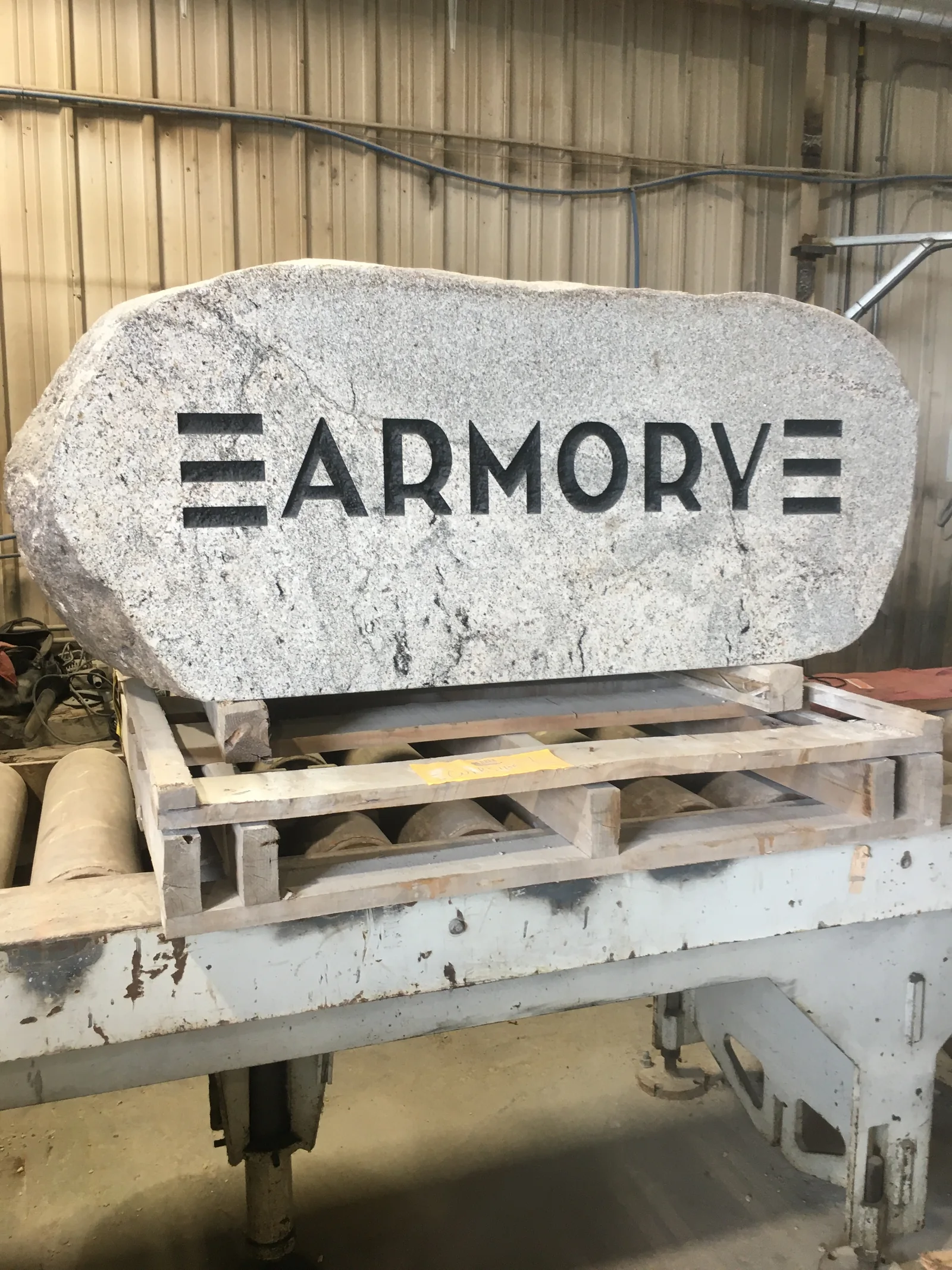 The Armory Rock on a pallet in the LetterNstone shop during engraving