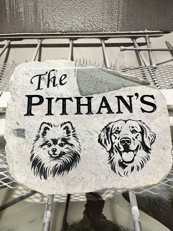 Custom engraved cut rock slab by LetterNstone