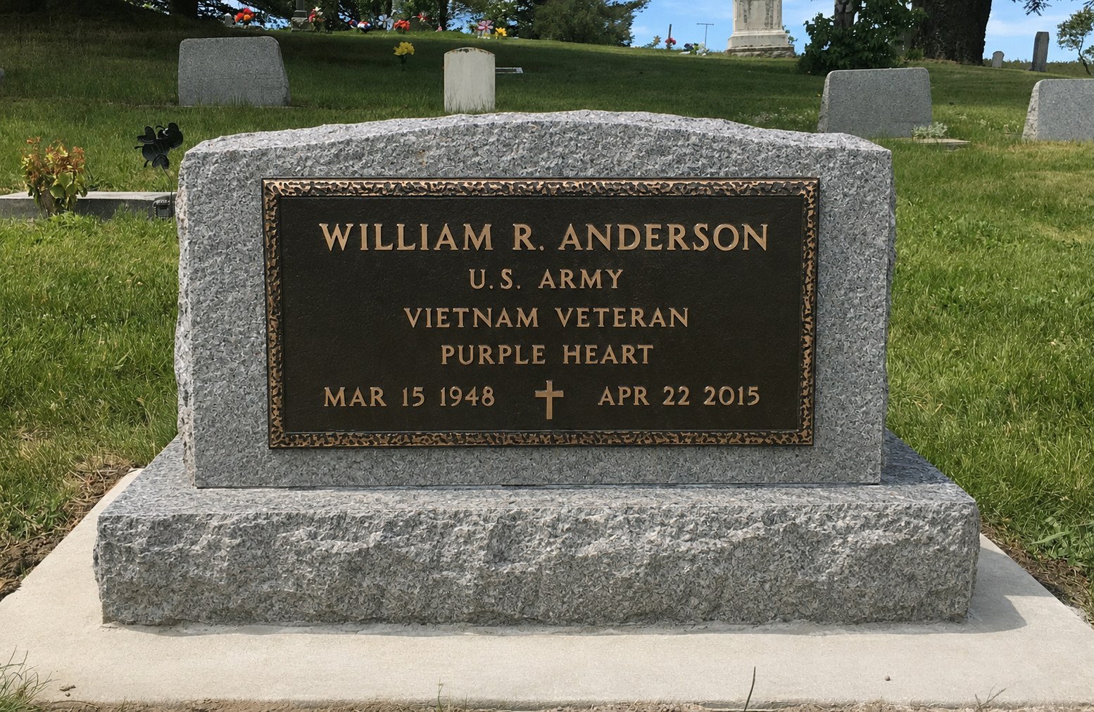 A bronze veteran's plaque by LetterNstone honoring military service