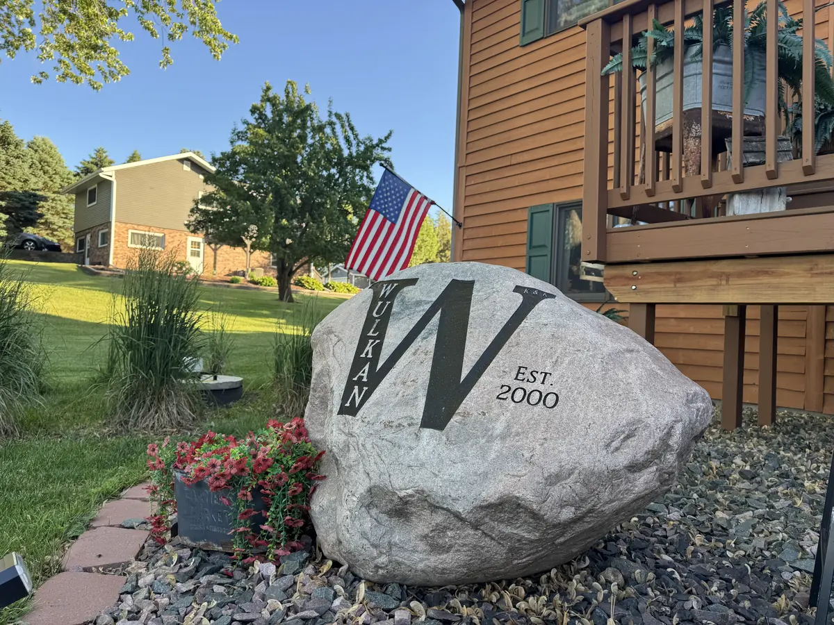 Wulkan K&K Est. 2000 — custom engraved granite yard rock by LetterNstone, daytime